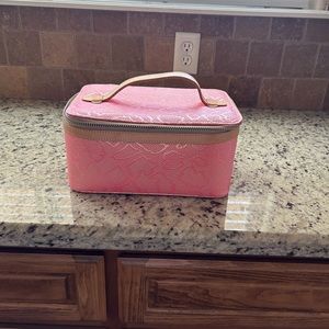 Consuela train case in apricot and tan leather